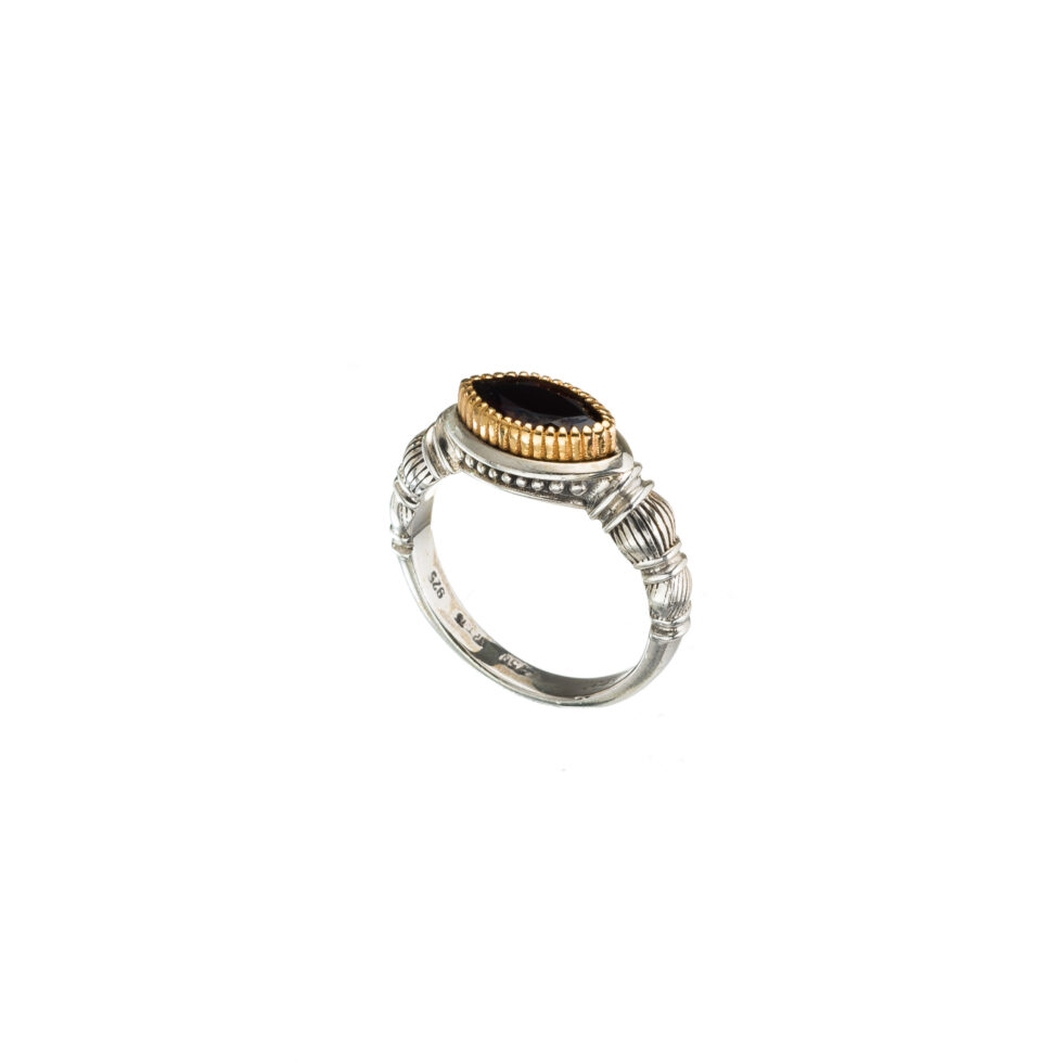 Ariadne ring in 18K Gold and Sterling Silver with garnet
