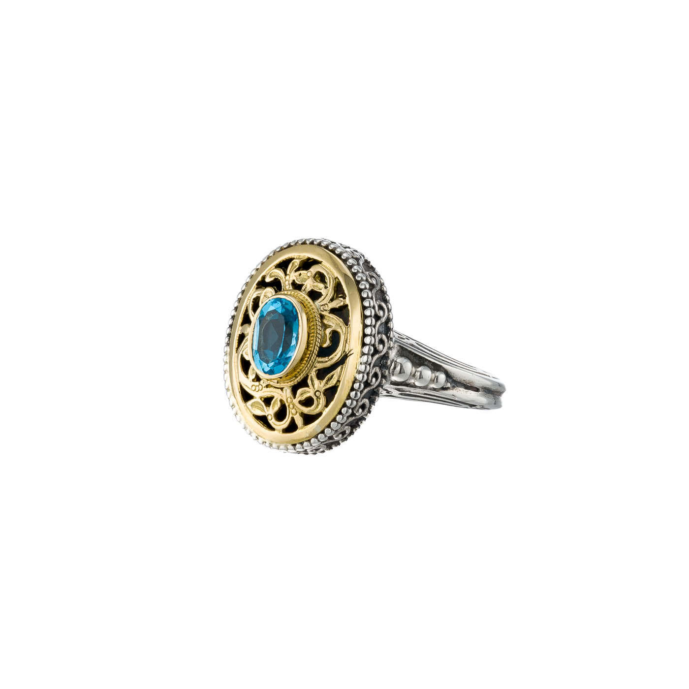 Garden Shadows oval ring in 18K Gold and Sterling Silver with blue topaz