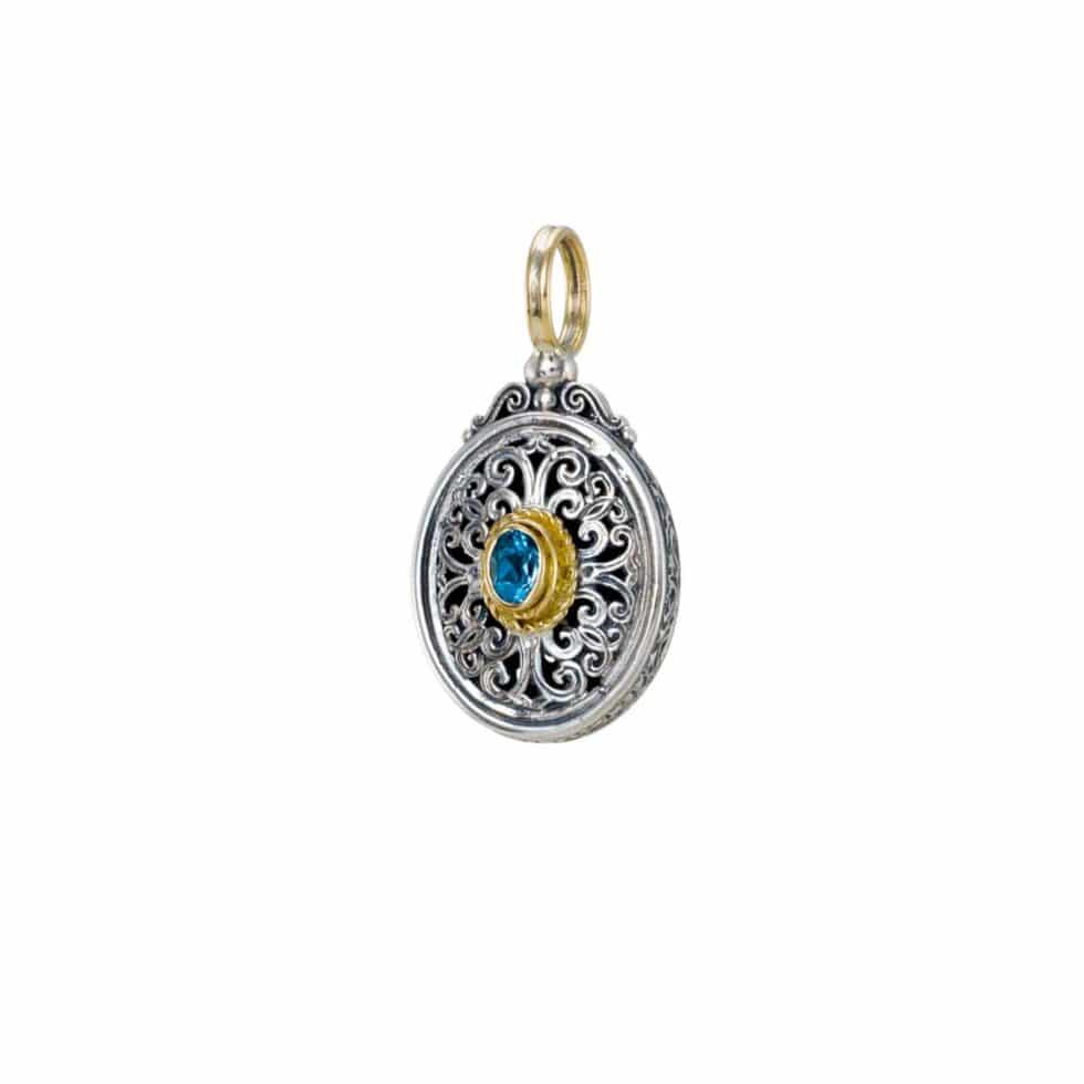 Mediterranean oval pendant in 18K Gold and Sterling silver with blue topaz