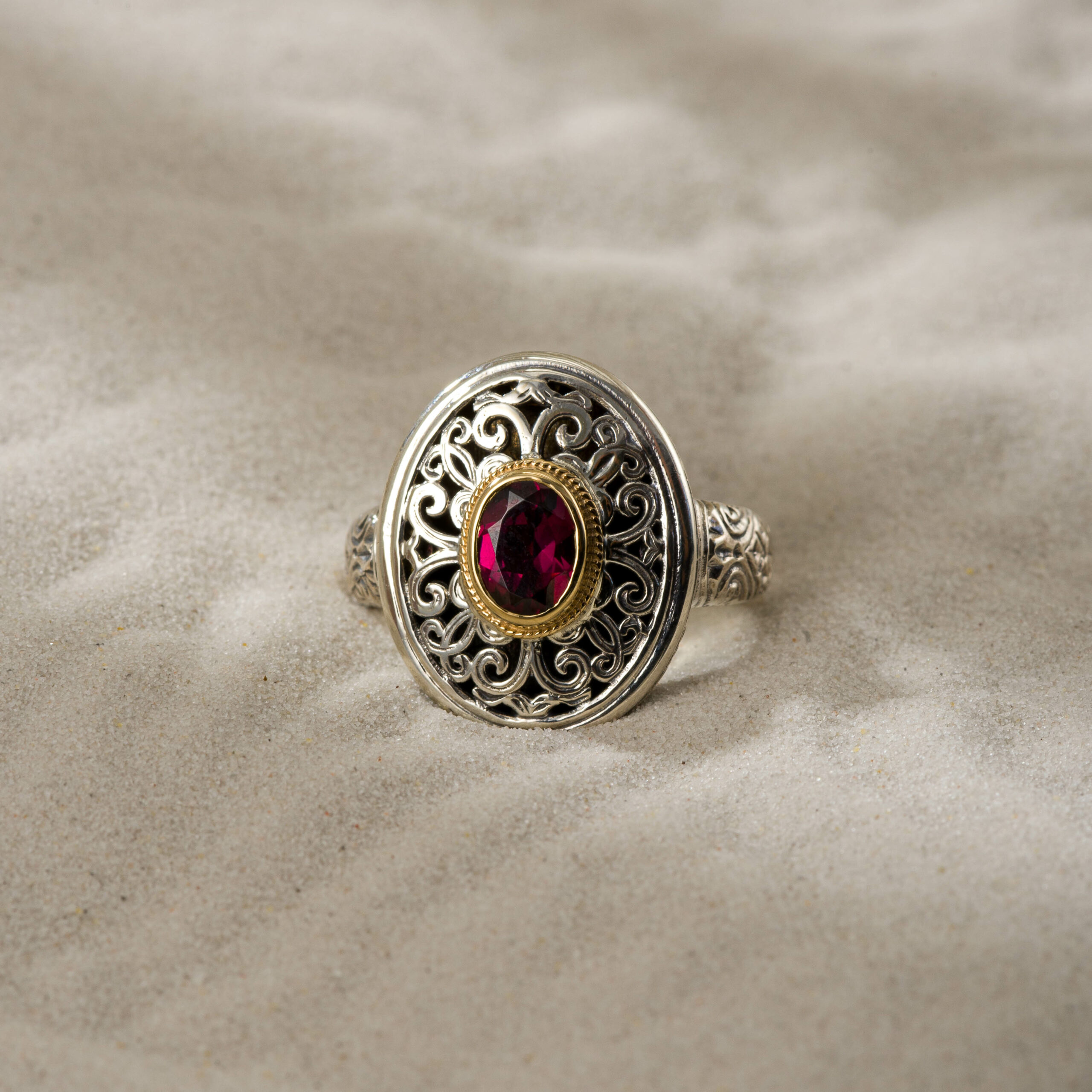 Mediterranean oval ring in 18K Gold and Sterling Silver with Rhodolite