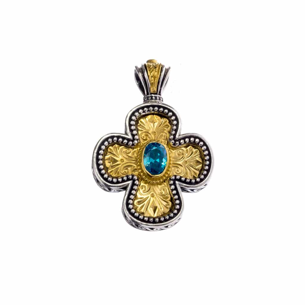 Cross in sterling silver with Gold plated parts and Cubic zirconia