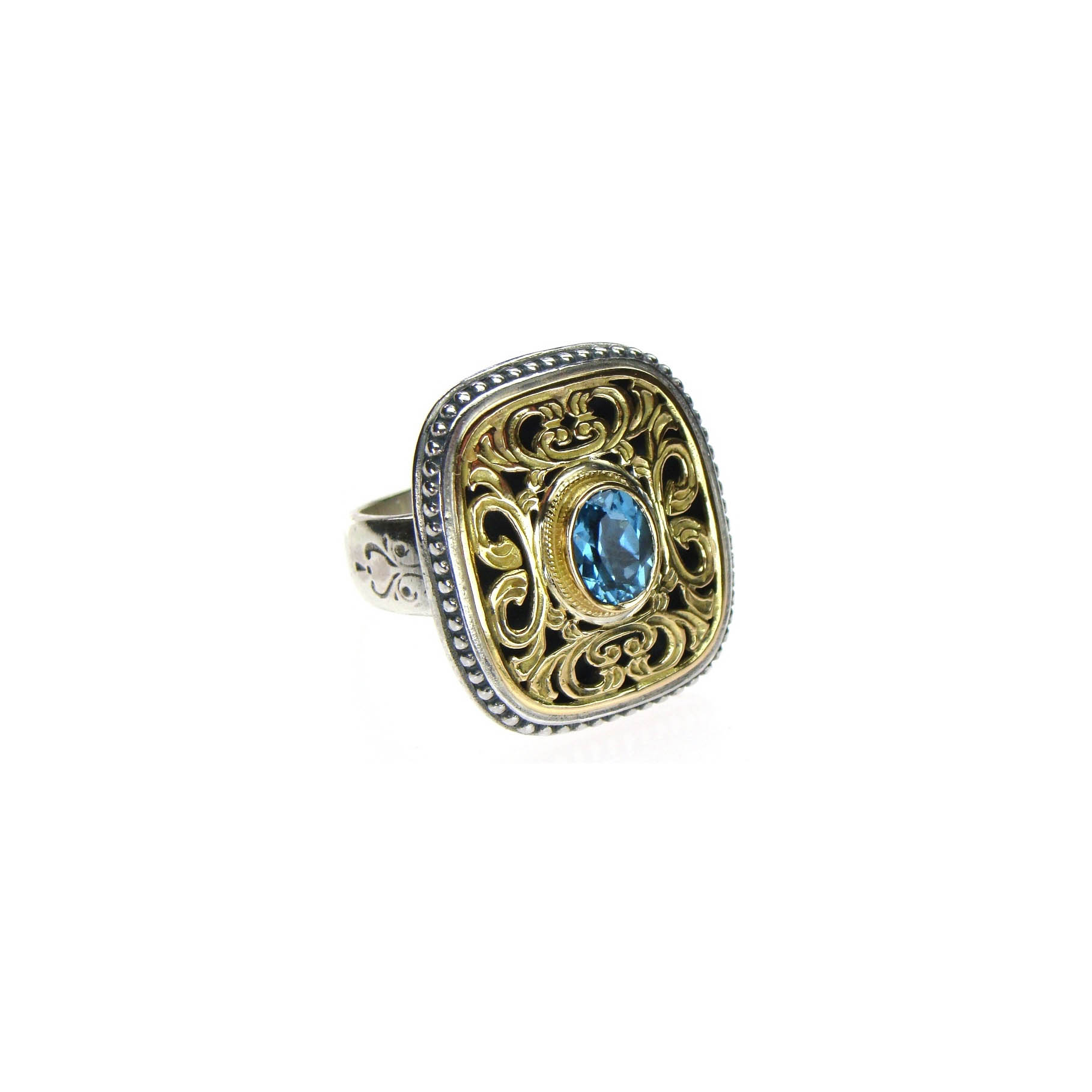 Garden shadows flat ring in 18K Gold and sterling silver with blue topaz