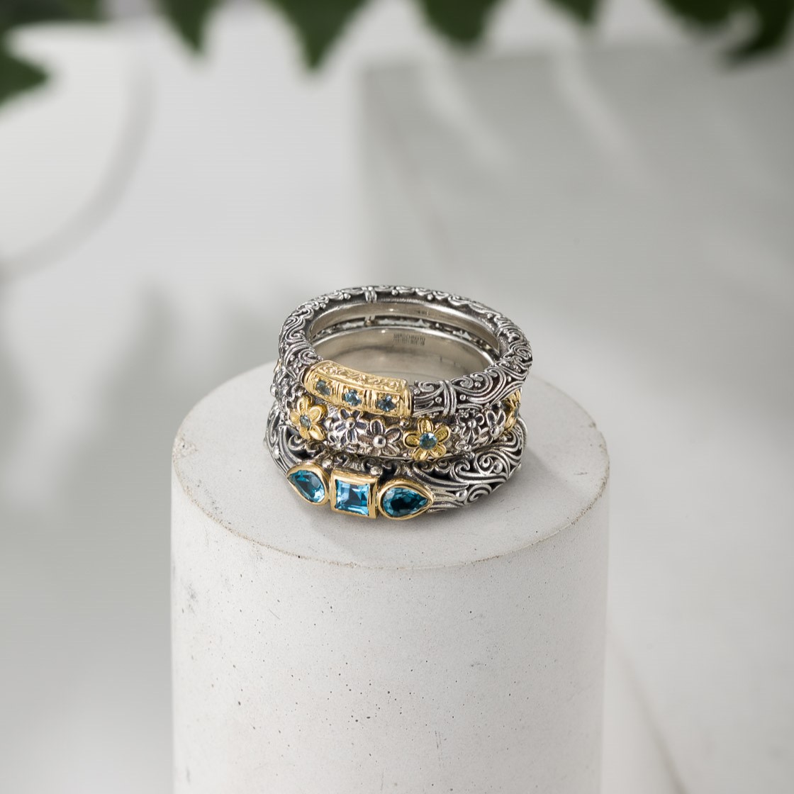 Ring Trilogies in 18K Gold and Sterling Silver with Blue topaz