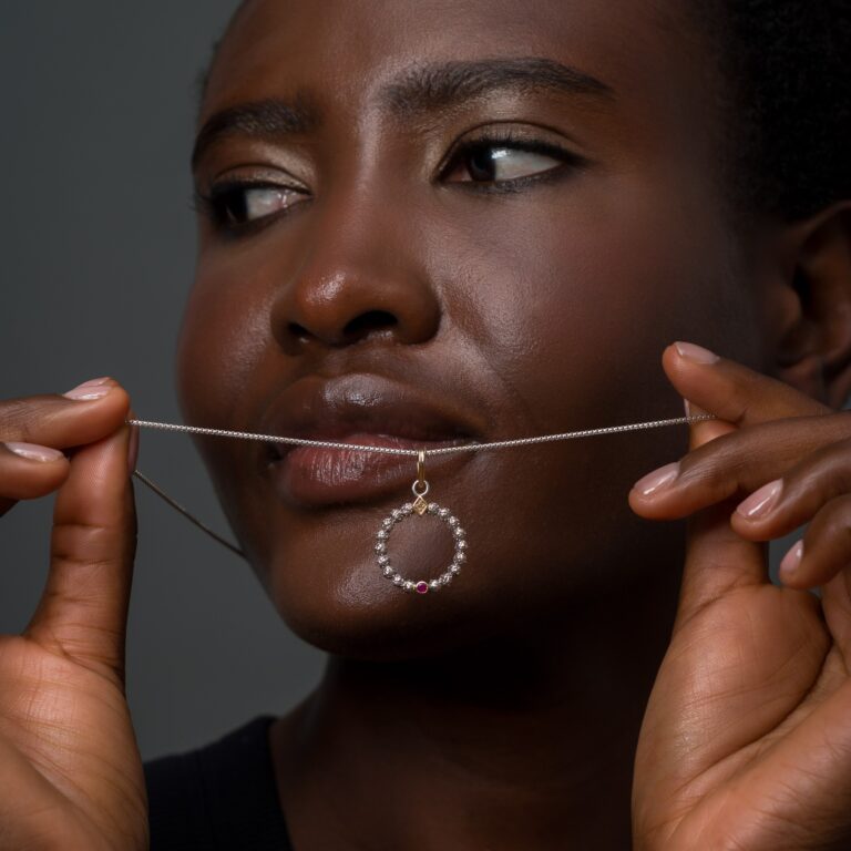 Eve circle Pendant in 18K Gold and sterling silver with Gemstones